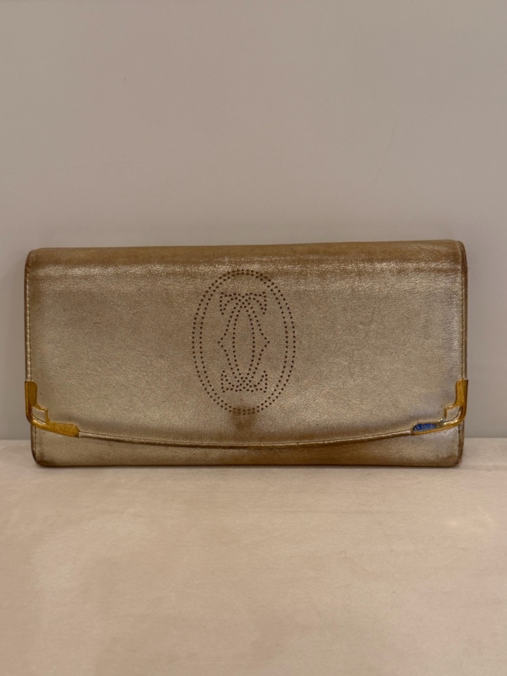 Cartier Gold Leather Wallet with Perforated Logo Detail